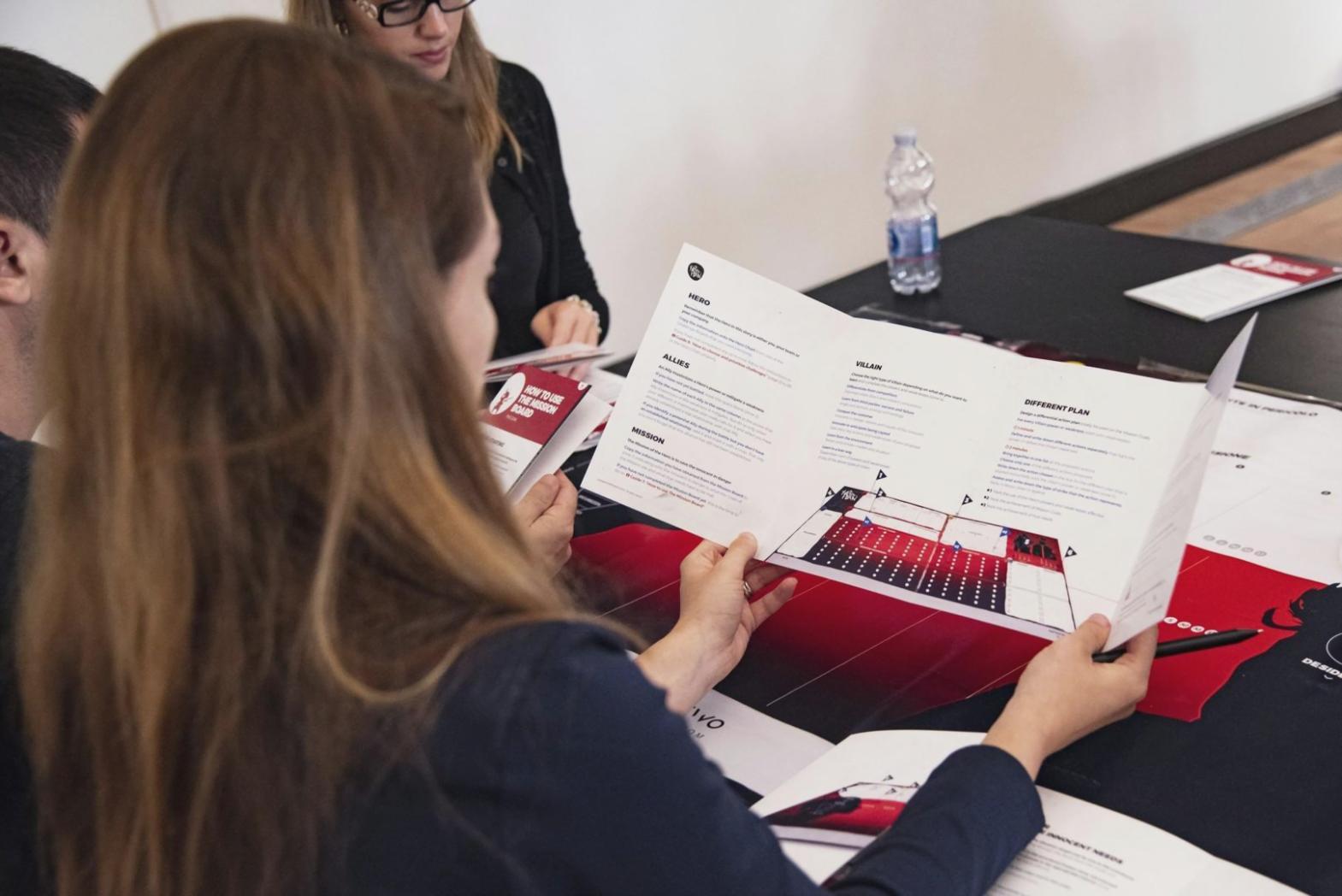 Professional financial planning session showing charts and documents